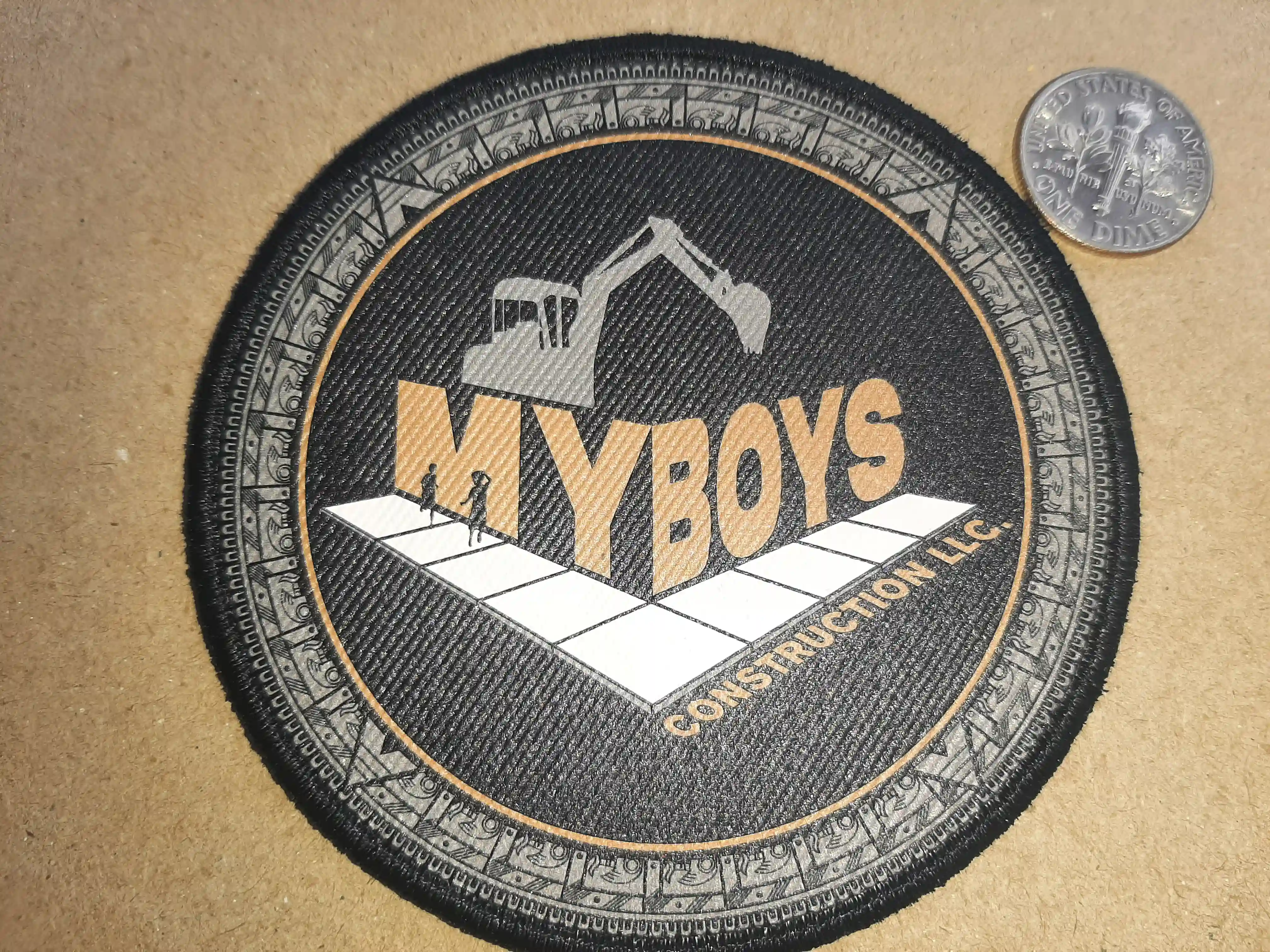 Beautiful side walk image with a perfectly clear and crisp Carved Ring aka Glyph Bands and the excavator My Boys Construction Construction